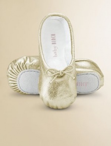 Shimmery leather is oh so sweet in classic ballerina flats with an elastic tie for a perfect fit.Leather upperAdjustable elastic tieCotton liningLeather soleImported Shimmery leather is oh so sweet in classic ballerina flats with an elastic tie for a perfect fit.Leather upperAdjustable elastic tieCotton liningLeather soleImported