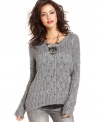 Metallic details add a modern appeal to this Kensie cable-knit sweater -- a hot layering piece!