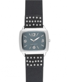 Liven up your look with this studded watch from Nine West. Crafted of black leather strap with stud detail and rectangular silver tone mixed metal case. Gray dial features silver tone numerals at three, six, nine and twelve o'clock, applied stick indices, minute track, luminous hour and minute hands, sweeping second hand and logo at six o'clock. Quartz movement. Limited lifetime warranty.