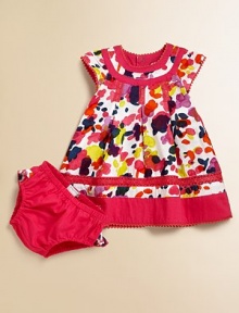 Bold, brilliant flowers, delicate lace detail and scalloped trim define this girly set complete with ruffled bloomers.Crewneck with scalloped trimShort capped sleeves with scalloped trimBack snapsEmbroidered yokePleated bodiceScalloped trim on hemElastic waistband and leg openingsBottom rufflesCottonMachine washImported Please note: Number of snaps may vary depending on size ordered. 