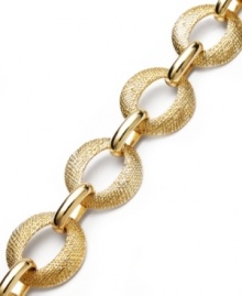 Textured message. A sandblast technique adds distinctive detailing to this stylish stretch bracelet from Charter Club. Made in gold tone mixed metal, it adjusts to fit wrist. Approximate length: 7-1/2 inches.