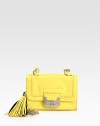 Vibrant leather in a demure flap front bag with oversized tassel accent.Chain-and-leather shoulder strap, 24¼ dropTurnlock flap closureOne outside open pocketOne inside zip pocketCotton lining7¼W X 5H X 1½DImported