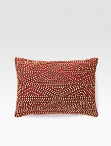 A rustic, wholly exotic pillow is defined by wood beads that add depth and texture wherever you place it.12 X 16Beaded cottonSpot cleanImported