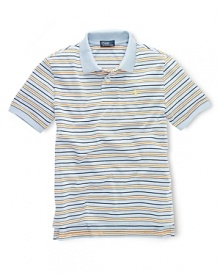 Rendered in lightweight, breathable cotton jersey, this classic polo design features a multicolored striped design for handsome appeal. Rendered in lightweight, breathable cotton jersey, this classic polo design features a multicolored striped design for handsome appeal.