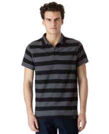 Bold bar stripes gives this polo shirt from Calvin Klein Jeans a strong, stylish look. Bold bar stripes gives this polo shirt from Calvin Klein Jeans a strong, stylish look.