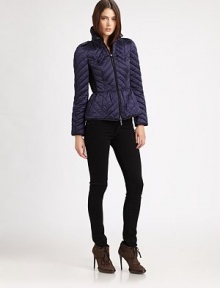 This sporty, quilted puffer style features a slightly flared peplum and crisp contrast piping.Stand collarEpaulettesZip frontContrast pipingContrast side panelsBack button tabsFully linedAbout 23 from shoulder to hemPolyesterImportedModel shown is 5'10 (177cm) wearing US size Small. This sporty, quilted puffer style features a slightly flared peplum and crisp contrast piping.Stand collarEpaulettesZip frontContrast pipingContrast side panelsBack button tabsFully linedAbout 23 from shoulder to hemPolyesterImportedModel shown is 5'10 (177cm) wearing US size Small.