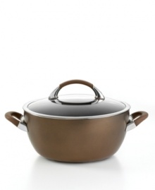 A deep, rich chocolate tone, with a superior nonstick finish and graceful, wide shape, turns things up in the kitchen, making every meal a mixture of sophistication and ease. Constructed for professional performance with a hard-anodized construction, impact-bonded stainless steel base and dishwasher-safe finish. Lifetime warranty. A deep, rich chocolate tone, with a superior nonstick finish and graceful, wide shape, turns things up in the kitchen, making every meal a mixture of sophistication and ease. Constructed for professional performance with a hard-anodized construction, impact-bonded stainless steel base and dishwasher-safe finish. Lifetime warranty.