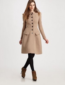 Sophisticated and ladylike, shaped with impeccable princess seams.Foldover collarSlightly puffed long sleevesButton frontFlap pocketsPrincess seamsBack button waist beltFully linedAbout 40 from shoulder to hem54% wool/30% polyester/13% polyamide/3% elastaneDry cleanMade in ItalyModel shown is 5'9 (175cm) wearing US size 4. Sophisticated and ladylike, shaped with impeccable princess seams.Foldover collarSlightly puffed long sleevesButton frontFlap pocketsPrincess seamsBack button waist beltFully linedAbout 40 from shoulder to hem54% wool/30% polyester/13% polyamide/3% elastaneDry cleanMade in ItalyModel shown is 5'9 (175cm) wearing US size 4.