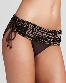 Take this season's exotic trend to the beach with this mud cloth-inspired bikini from Ralph Lauren Blue Label. This suit portrays far-flung cool with an armload of bangles and sandals. Take this season's exotic trend to the beach with this mud cloth-inspired bikini from Ralph Lauren Blue Label. This suit portrays far-flung cool with an armload of bangles and sandals.