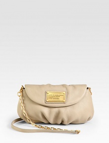 A convertible silhouette of soft and slouchy leather with a chic chain and leather strap.Removable shoulder strap, 23 dropMagnetic flap closureSix credit card slotsOne inside open pocketFully lined9W X 5½H X 3/4DImported A convertible silhouette of soft and slouchy leather with a chic chain and leather strap.Removable shoulder strap, 23 dropMagnetic flap closureSix credit card slotsOne inside open pocketFully lined9W X 5½H X 3/4DImported