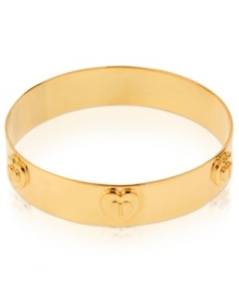 Simply elegant. Betsey Johnson's bangle bracelet is crafted from gold-tone mixed metal with heart details and metal beads for a subtle, yet bold, statement. Approximate diameter: 2-1/2 inches.