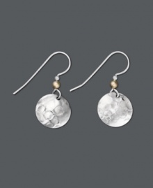 Embrace exquisite design with these clever drop earrings by Jody Coyote. Disc surface features a hammered design in sterling silver with an antique gold tone mixed metal accent bead. Approximate drop: 1-1/8 inches. Embrace exquisite design with these clever drop earrings by Jody Coyote. Disc surface features a hammered design in sterling silver with an antique gold tone mixed metal accent bead. Approximate drop: 1-1/8 inches.