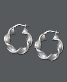 Tired of the same old style? Add a twist! These chic, hoop earrings feature a twisted design in 14k white gold. Approximate diameter: 1-1/4 inches. Tired of the same old style? Add a twist! These chic, hoop earrings feature a twisted design in 14k white gold. Approximate diameter: 1-1/4 inches.