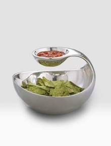 A small bowl fit for salsa, dips or nuts hovers over the larger bowl via a graceful arc in a wholly original conversation piece crafted in two tiers of gleaming metal alloy. Metal 8H X 11 diam. Imported A small bowl fit for salsa, dips or nuts hovers over the larger bowl via a graceful arc in a wholly original conversation piece crafted in two tiers of gleaming metal alloy. Metal 8H X 11 diam. Imported