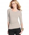 Vince Camuto's top looks super polished--ruched sleeves add plenty of femme flair to a classic silhouette.