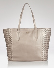 Cole Haan's most practical style is dressed up with luxe leather and woven details. Ample pockets and a roomy interior make this style ideal for the busy (but stylish) woman. Cole Haan's most practical style is dressed up with luxe leather and woven details. Ample pockets and a roomy interior make this style ideal for the busy (but stylish) woman.