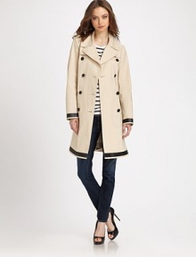 Utilitarian, wear-anywhere trenchcoat with a self tie, double placket and bold contrast trim. Notched collarDouble placketButton frontLong sleevesSelf tie at waistBack ventAbout 40 from shoulder to hemCottonDry cleanImported of Italian fabricModel shown is 5'10 (177cm) wearing US size Small. Utilitarian, wear-anywhere trenchcoat with a self tie, double placket and bold contrast trim. Notched collarDouble placketButton frontLong sleevesSelf tie at waistBack ventAbout 40 from shoulder to hemCottonDry cleanImported of Italian fabricModel shown is 5'10 (177cm) wearing US size Small.
