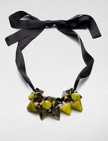 Glossy resin and natural horn in an interesting cluster pattern on a sweet ribbon. ResinHornLength, about 18 to 31 adjustableRibbon tie closureMade in Italy Glossy resin and natural horn in an interesting cluster pattern on a sweet ribbon. ResinHornLength, about 18 to 31 adjustableRibbon tie closureMade in Italy