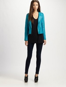 Rich lambskin takes on a metallic sheen in this cropped jacket styled easy-fit stretch panels.Foldover lapelAsymmetrical front zipperZip pocketsZip cuffsBack zip-ventAbout 20 from shoulder to hemBody: leather; panels: 68% rayon/27% nylon/5% spandexDry cleanImportedModel shown is 5'9 (175cm) wearing US size Small. Rich lambskin takes on a metallic sheen in this cropped jacket styled easy-fit stretch panels.Foldover lapelAsymmetrical front zipperZip pocketsZip cuffsBack zip-ventAbout 20 from shoulder to hemBody: leather; panels: 68% rayon/27% nylon/5% spandexDry cleanImportedModel shown is 5'9 (175cm) wearing US size Small.