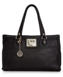 Add a little uptown attitude to your everyday look with this posh carryall from DKNY. Buttery-soft leather and gleaming golden hardware provide polish, while the slender crossbody strap and interior compartments offer instant versatility. Add a little uptown attitude to your everyday look with this posh carryall from DKNY. Buttery-soft leather and gleaming golden hardware provide polish, while the slender crossbody strap and interior compartments offer instant versatility.