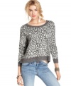 Slouchy yet chic, this leopard-print Free People sweater is perfect for a bit of wild style on a casual look!