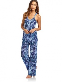 THE LOOKFloral printV-neckSleeveless with knotted detailsPleated detailsElastic waistWide leg silhouetteTHE FITTop: about 27 from shoulder to hemPants: rise, about 9; inseam, about 30THE MATERIALNylonCARE & ORIGINMachine washImportedModel shown is 5'10 (177cm) wearing US size Small. THE LOOKFloral printV-neckSleeveless with knotted detailsPleated detailsElastic waistWide leg silhouetteTHE FITTop: about 27 from shoulder to hemPants: rise, about 9; inseam, about 30THE MATERIALNylonCARE & ORIGINMachine washImportedModel shown is 5'10 (177cm) wearing US size Small.