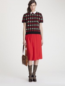 Brightly-hued crepe, tailored with crisp pleats and accented by a sporty, striped waistband.Constrast elastic waistbandSkirt pleatsConcealed side zipAbout 25 long65% acetate/35% silkDry cleanImportedModel shown is 5'11 (180cm) wearing US size 4. Brightly-hued crepe, tailored with crisp pleats and accented by a sporty, striped waistband.Constrast elastic waistbandSkirt pleatsConcealed side zipAbout 25 long65% acetate/35% silkDry cleanImportedModel shown is 5'11 (180cm) wearing US size 4.