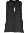 With its filmy silk and modern peek-a-boo styling, A.L.C.s black tank top is a cool choice for building edgy layered looks - Round neckline with slit and hook closure at throat, sleeveless, raglan seaming, slit back, sheer - Loosely fitted - Wear with figure-hugging separates and a boyfriend blazer or leather jacket