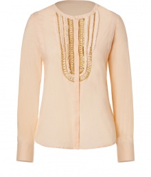 With a luxe 1970s-inspired style, this embroidered top is a workweek essential - Round neck, long sleeves, bib-like front with embroidery, rounded hem, relaxed silhouette - Wear with high waisted flares, a loose knit cardigan, and platform sandals