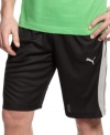 With a cool color-blocked style, these lightweight mesh shorts from Puma raise the bar on your gym gear.