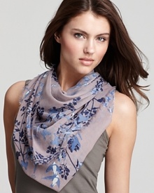 Flocks of birds and floral print decorate this elegant woven scarf from Fraas. Flocks of birds and floral print decorate this elegant woven scarf from Fraas.