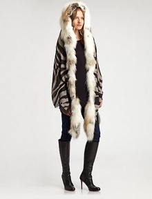 Luxurious, natural fox fur trims this transformable hooded wrap, accented by a zebra print on modal and cashmere.90% modal/10% cashmereAbout 28 X 79Dry cleanMade in ItalyFur origin: Finland Luxurious, natural fox fur trims this transformable hooded wrap, accented by a zebra print on modal and cashmere.90% modal/10% cashmereAbout 28 X 79Dry cleanMade in ItalyFur origin: Finland
