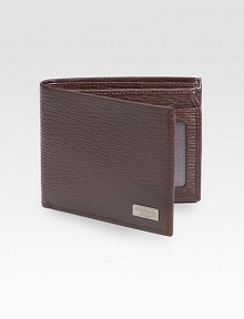 Stamped calfskin wallet with five credit card slots, two currency departments and one ID window. 4½W X 3½H Made in Italy Stamped calfskin wallet with five credit card slots, two currency departments and one ID window. 4½W X 3½H Made in Italy