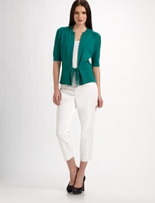 Short and sweet, but also sophisticated, this versatile sweater of cotton and silk has a peplum-like shape and rich ribbed textures.Ribbed band necklineShoulder detailingElbow-length sleeves with ribbed detail and cuffsPatterned ribbed backSeamed waist with ribbon tiesAbout 22¾ from shoulder to hem70% cotton/30% silkDry cleanImported Model shown is 5'9½ (176cm) wearing US size Small. Short and sweet, but also sophisticated, this versatile sweater of cotton and silk has a peplum-like shape and rich ribbed textures.Ribbed band necklineShoulder detailingElbow-length sleeves with ribbed detail and cuffsPatterned ribbed backSeamed waist with ribbon tiesAbout 22¾ from shoulder to hem70% cotton/30% silkDry cleanImported Model shown is 5'9½ (176cm) wearing US size Small.