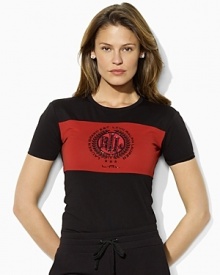An iconic tee in soft cotton jersey is embellished with a beaded logo for a chic, heritage look. An iconic tee in soft cotton jersey is embellished with a beaded logo for a chic, heritage look.