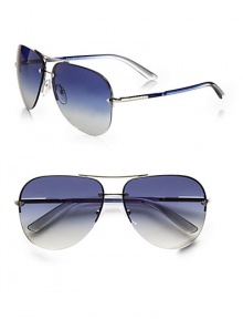 Favorite aviator design in a modern rimless style with logo engraved detail. Available in silver with blue gradient lens and brown demi shiny with brown gradient lens.UV400 lensTubular templeMade in Italy Favorite aviator design in a modern rimless style with logo engraved detail. Available in silver with blue gradient lens and brown demi shiny with brown gradient lens.UV400 lensTubular templeMade in Italy