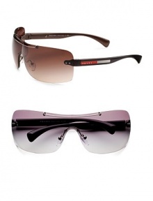 A modern, rimless look with metal logo temple detail. Available in brown frames with brown gradient lenses or black frames with grey gradient lenses. Logo temple detail UV400 protective Made in Italy A modern, rimless look with metal logo temple detail. Available in brown frames with brown gradient lenses or black frames with grey gradient lenses. Logo temple detail UV400 protective Made in Italy