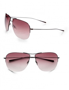 This double-bridge semi-rimless design, featuring a metal front with beta-titanium temples, is ultra lightweight and comfortable. Available in walnut with spice brown gradient lens.100% UV protectionImported This double-bridge semi-rimless design, featuring a metal front with beta-titanium temples, is ultra lightweight and comfortable. Available in walnut with spice brown gradient lens.100% UV protectionImported