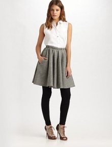 Crisp cotton poplin, tailored in a chic button-down silhouette finished with raw-edge seams.Point collar Sleeveless Button-down placket Shirttail hem About 24 from shoulder to hem Cotton Dry clean Imported Crisp cotton poplin, tailored in a chic button-down silhouette finished with raw-edge seams.Point collar Sleeveless Button-down placket Shirttail hem About 24 from shoulder to hem Cotton Dry clean Imported