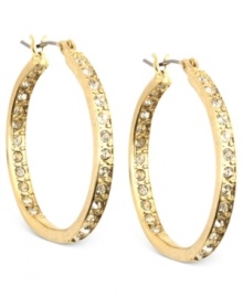 Getting these hoop earrings from Anne Klein should be a crystal-clear decision. Crafted from gold-tone mixed metal, the earrings inside and out feature glass crystal accents to make you look like a shining star. Approximate diameter: 1 inch.