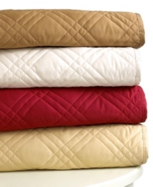 Sumptuous style. Layer your bed with this Regent quilt from Lauren by Ralph Lauren, featuring plush 600-thread count cotton sateen and quilted details for luxe texture. Comes in four rich hues. Sumptuous style. Layer your bed with this Regent quilt from Lauren by Ralph Lauren, featuring plush 600-thread count cotton sateen and quilted details for luxe texture. Comes in four rich hues.