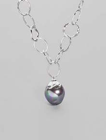 An open link chain of hammered sterling silver is highlighted by an iridiscent organic grey pearl drop. 22mm man-made pearl Sterling silver Length, about 17 Lobster clasp with charm detail Made in Spain An open link chain of hammered sterling silver is highlighted by an iridiscent organic grey pearl drop. 22mm man-made pearl Sterling silver Length, about 17 Lobster clasp with charm detail Made in Spain