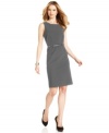 Slate grey lightens up a petite sheath dress from Calvin Klein. Origami-inspired darts at the waist add a fresh, architectural touch.