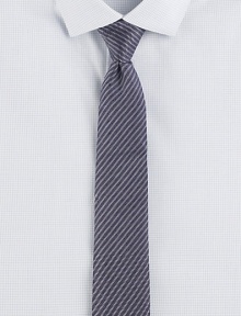 Trim stripes, pared in width to balance the cut of modern suits and jackets.SilkDry cleanMade in USA