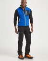 Rendered in plush microfleece for supreme warmth without the weight, this sporty topper features moisture-wicking technology and sleek microfiber piecing for added ventilation Zip frontVertical zip pocket with reflective details at the chestSide zip pocketsMockneck collarBreathable microfiber panels accent the shoulders