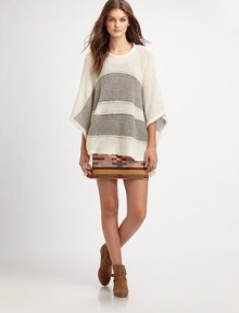 A soft blend of alpaca and wool, loosely styled in a slouchy pullover.RoundneckDropped shouldersOpen sleevesPullover styleAbout 26 from shoulder to hem45% nylon/30% alpaca/25% woolDry cleanMade in USA of Italian fabricModel shown is 5'10 (177cm) wearing US size X-Small / Small. A soft blend of alpaca and wool, loosely styled in a slouchy pullover.RoundneckDropped shouldersOpen sleevesPullover styleAbout 26 from shoulder to hem45% nylon/30% alpaca/25% woolDry cleanMade in USA of Italian fabricModel shown is 5'10 (177cm) wearing US size X-Small / Small.