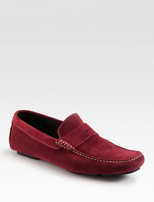 Soft suede penny loafer with intricate contrast stitching and a convenient rubber sole. Suede upperLeather liningPadded insoleSuede and rubber soleMade in Italy