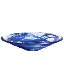 A dramatic accent, the Tempera Blue dish features heavy glass laced with hand-painted swirls of deep blue. Designed by Anna Ehrner for Kosta Boda.