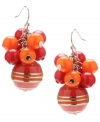 Amp up your look with a sweet splash of citrus. Haskell's chic cluster earrings feature orange and fuchsia beads with striped metallic details. Crafted in mixed metal. Approximate drop: 1-1/2 inches.