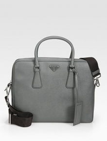 Sharp and sophisticated in textured saffiano leather with detachable shoulder strap.Zip closureDouble top handlesAdjustable shoulder strapInterior pocketsFully lined14¼W x 11¼H x 3¼DMade in Italy Sharp and sophisticated in textured saffiano leather with detachable shoulder strap.Zip closureDouble top handlesAdjustable shoulder strapInterior pocketsFully lined14¼W x 11¼H x 3¼DMade in Italy